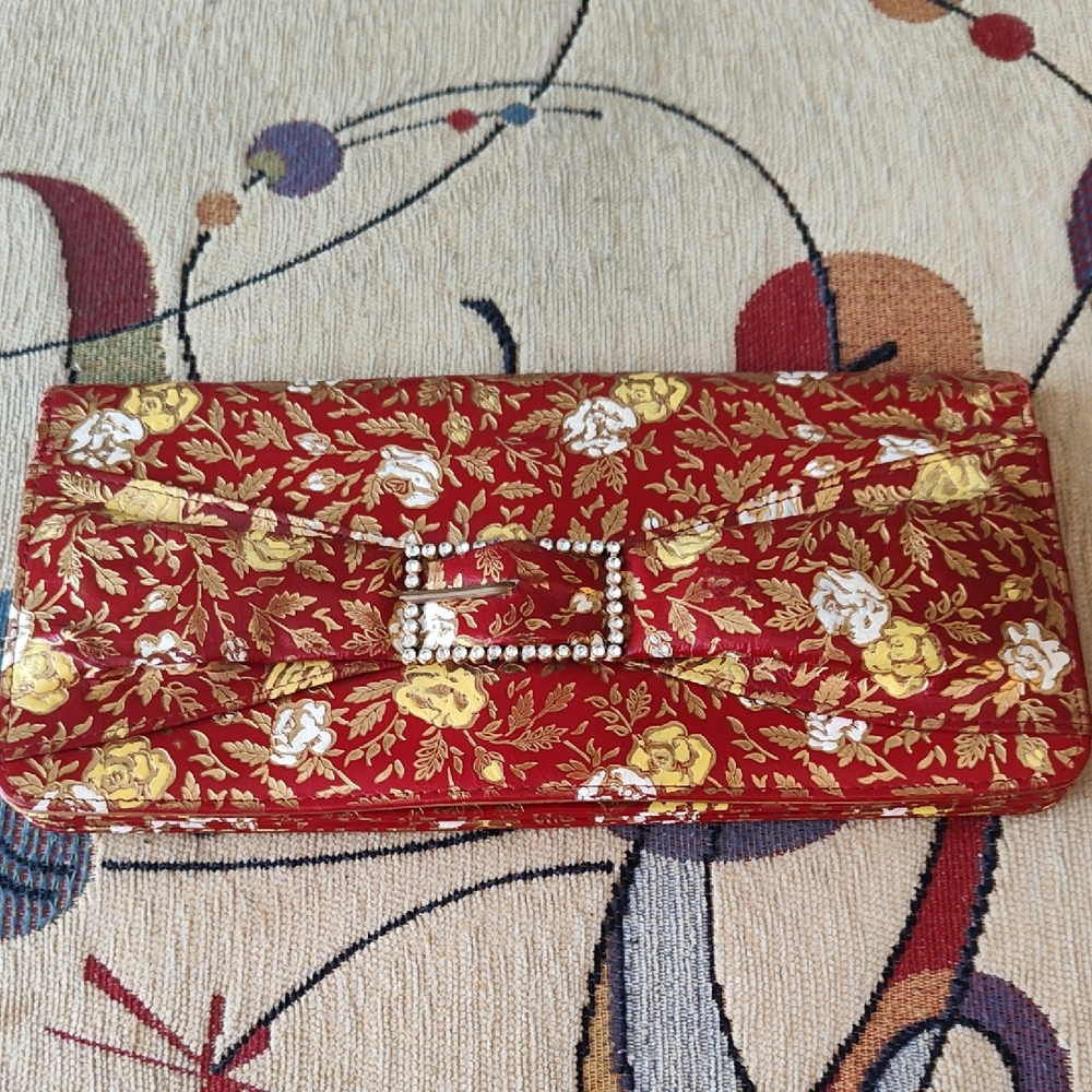 Vibrant Red and Yellow Clutch with Ornate Gold Accents